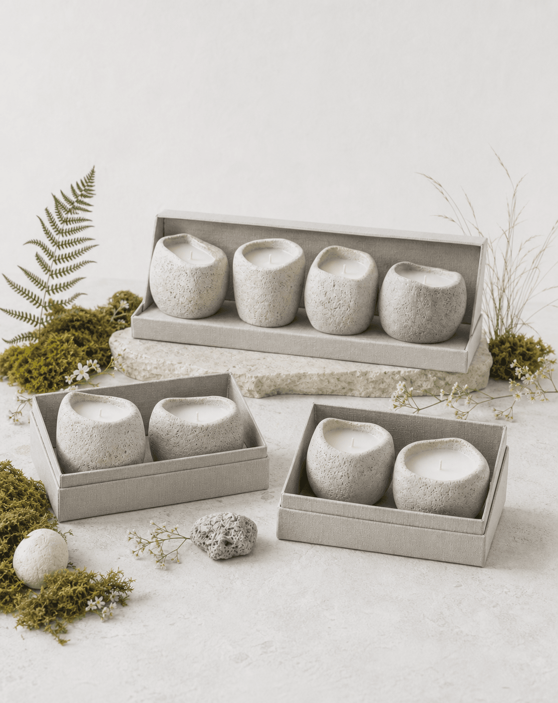 EMBER & MOSS stone candle gift sets arranged with dried botanicals
